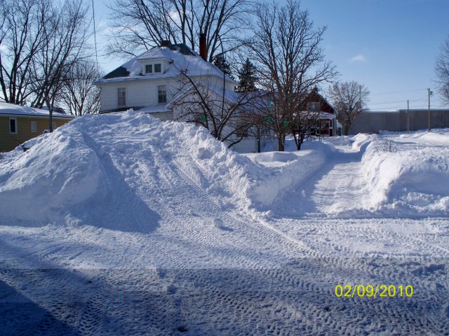 Snow pile by garage north face reduced.jpg